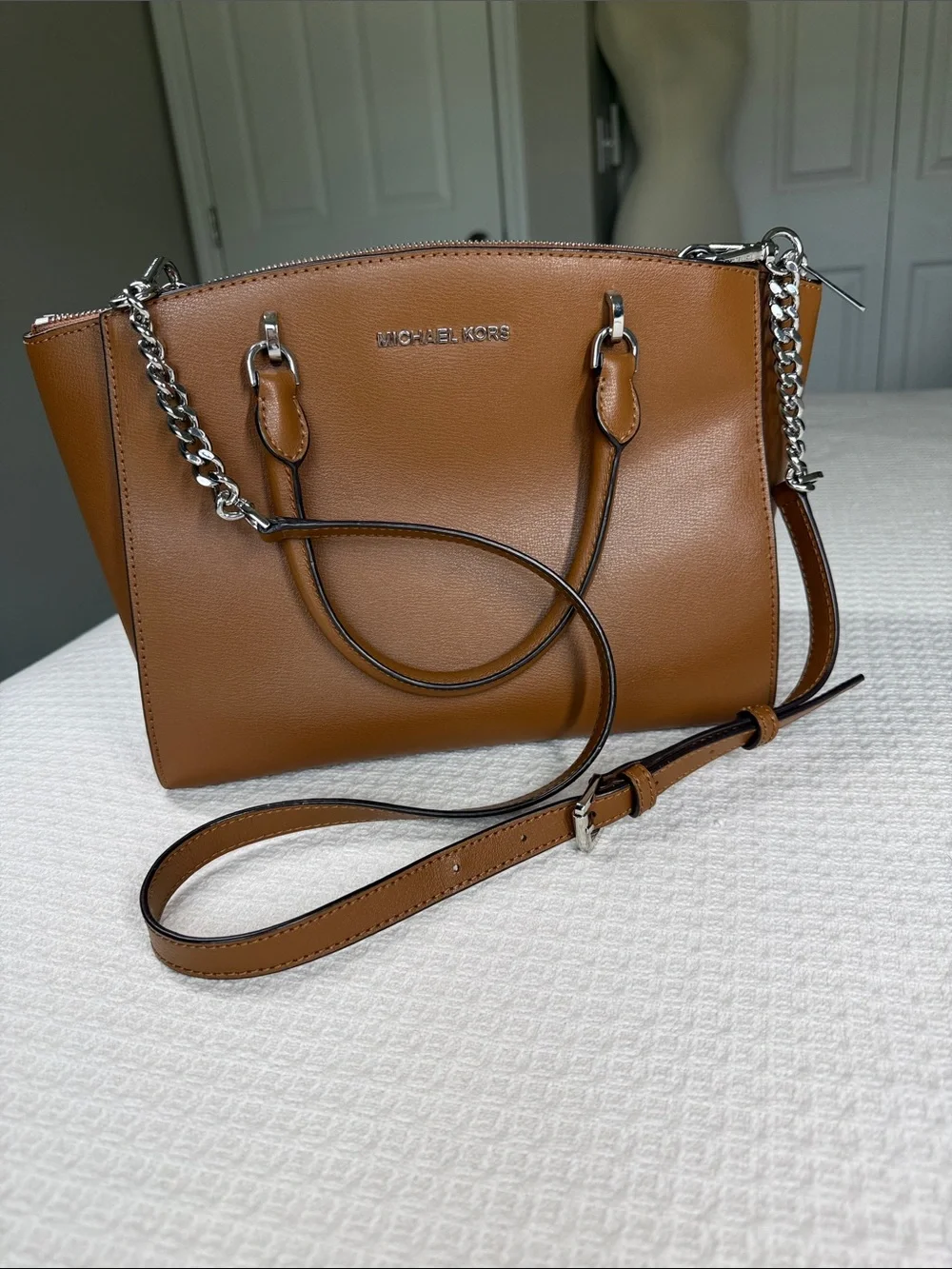 Michael Kors saddle tan saffiano leather satchel with silver hardware
